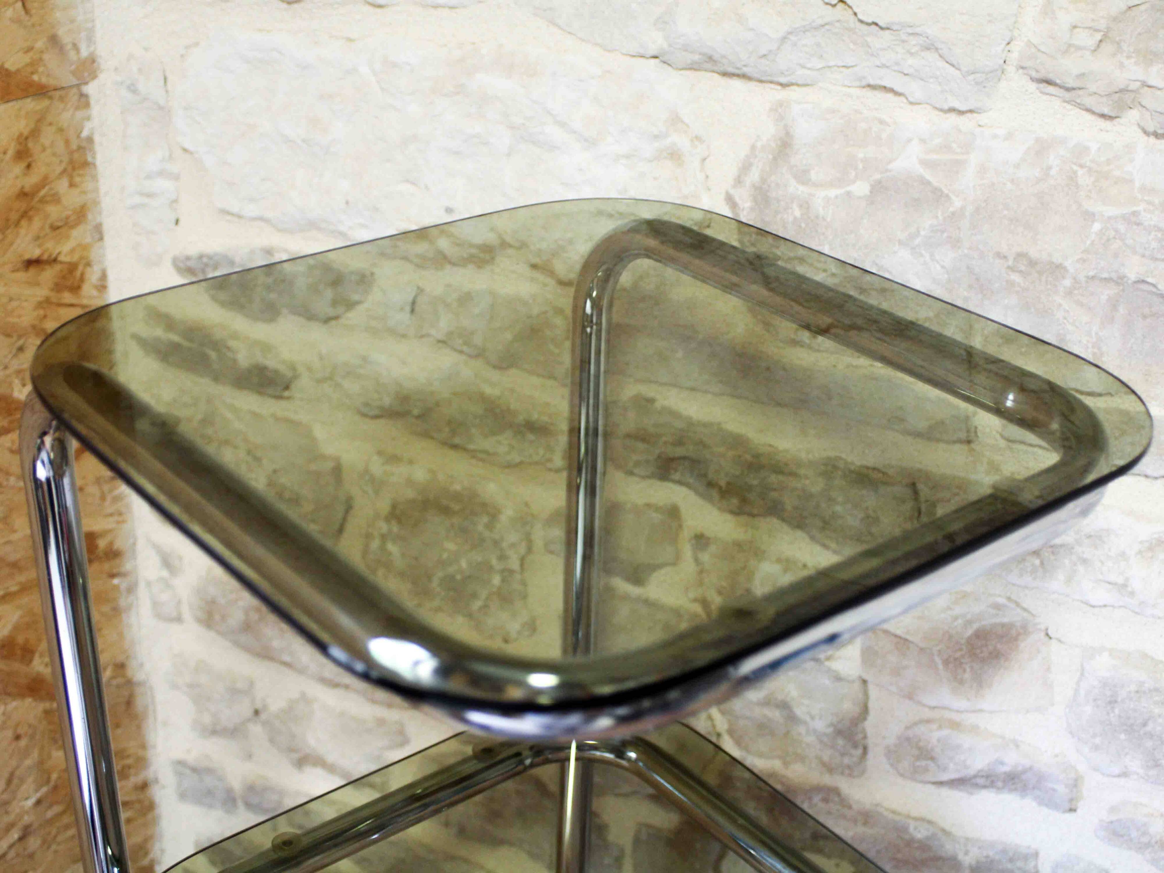 Chrome metal and smoked glass side table.