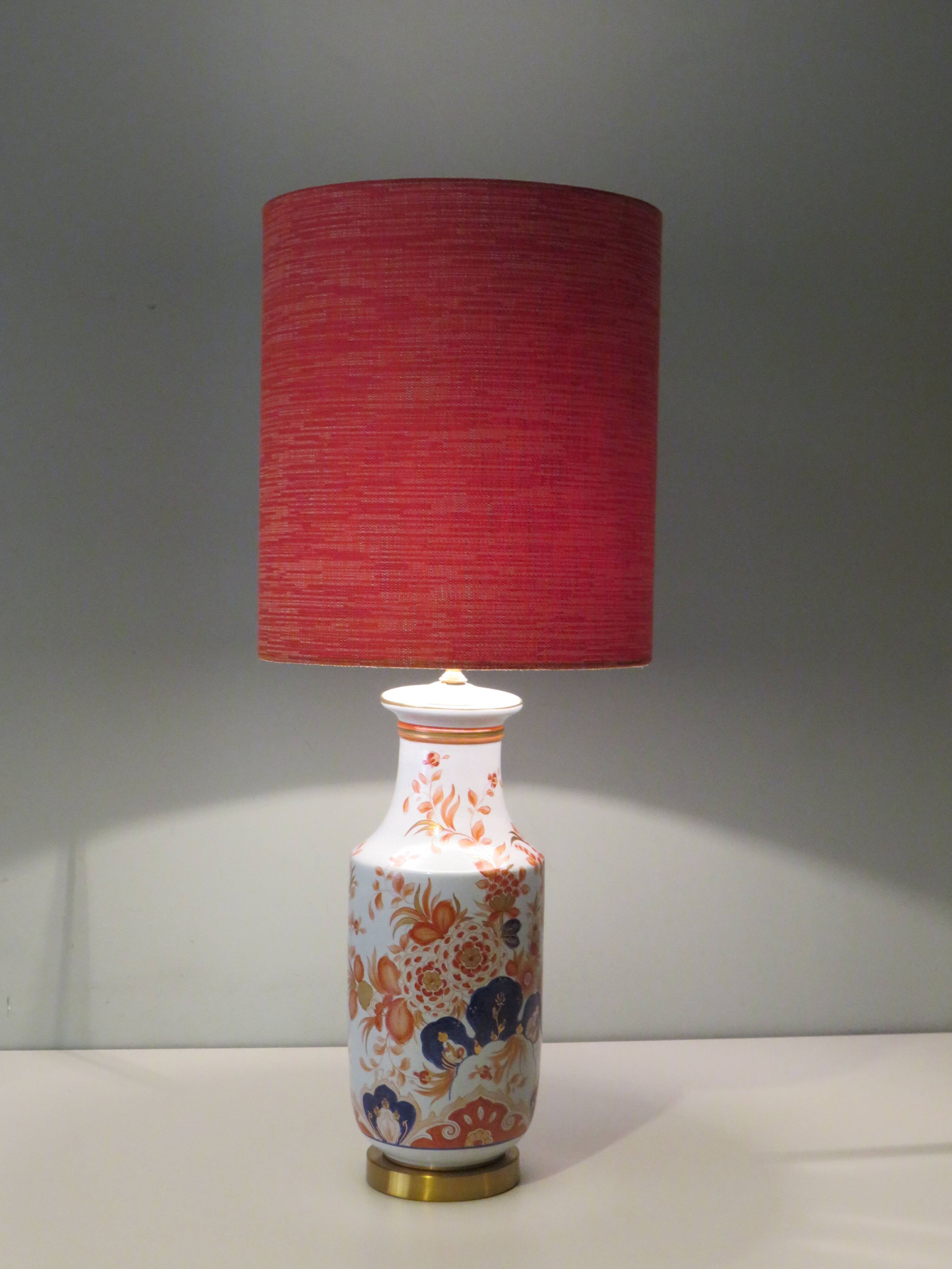 Vintage ceramic table lamp with Imari-inspired pattern.