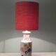 Vintage ceramic table lamp with Imari-inspired pattern.