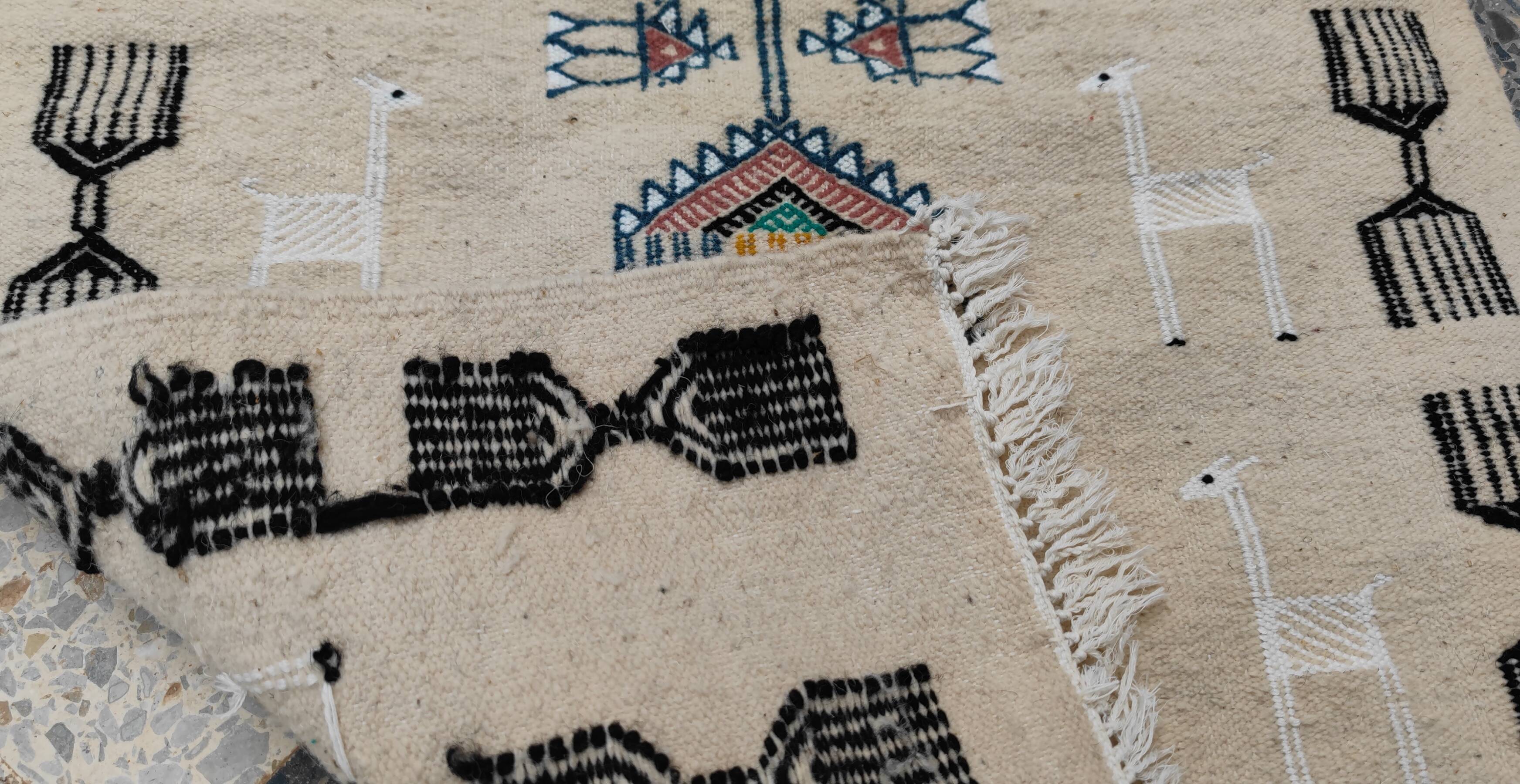 Handwoven kilim rug in natural wool