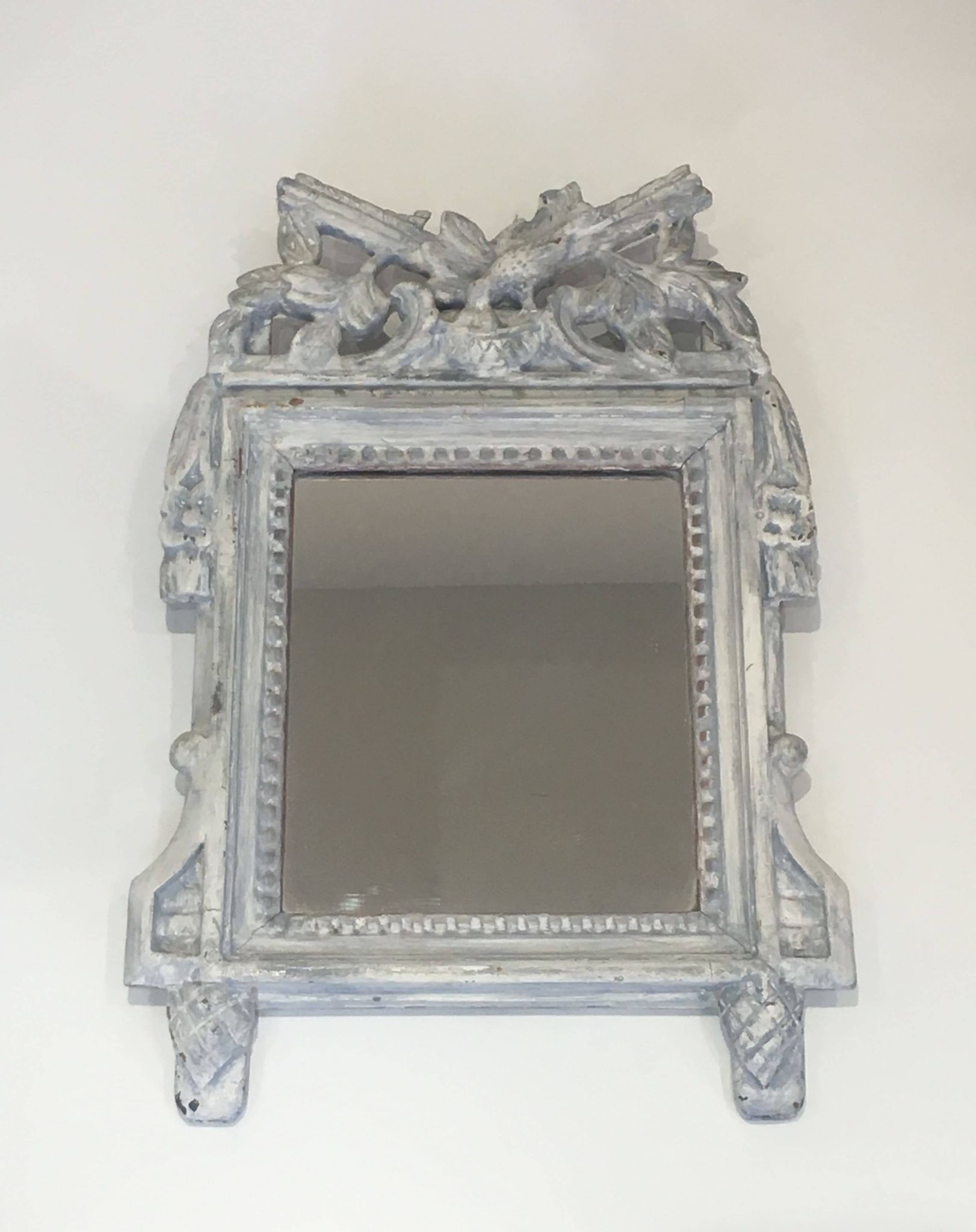 Louis XVI Style Mirror in Carved Wood with Grey Patina and Dove Pediment