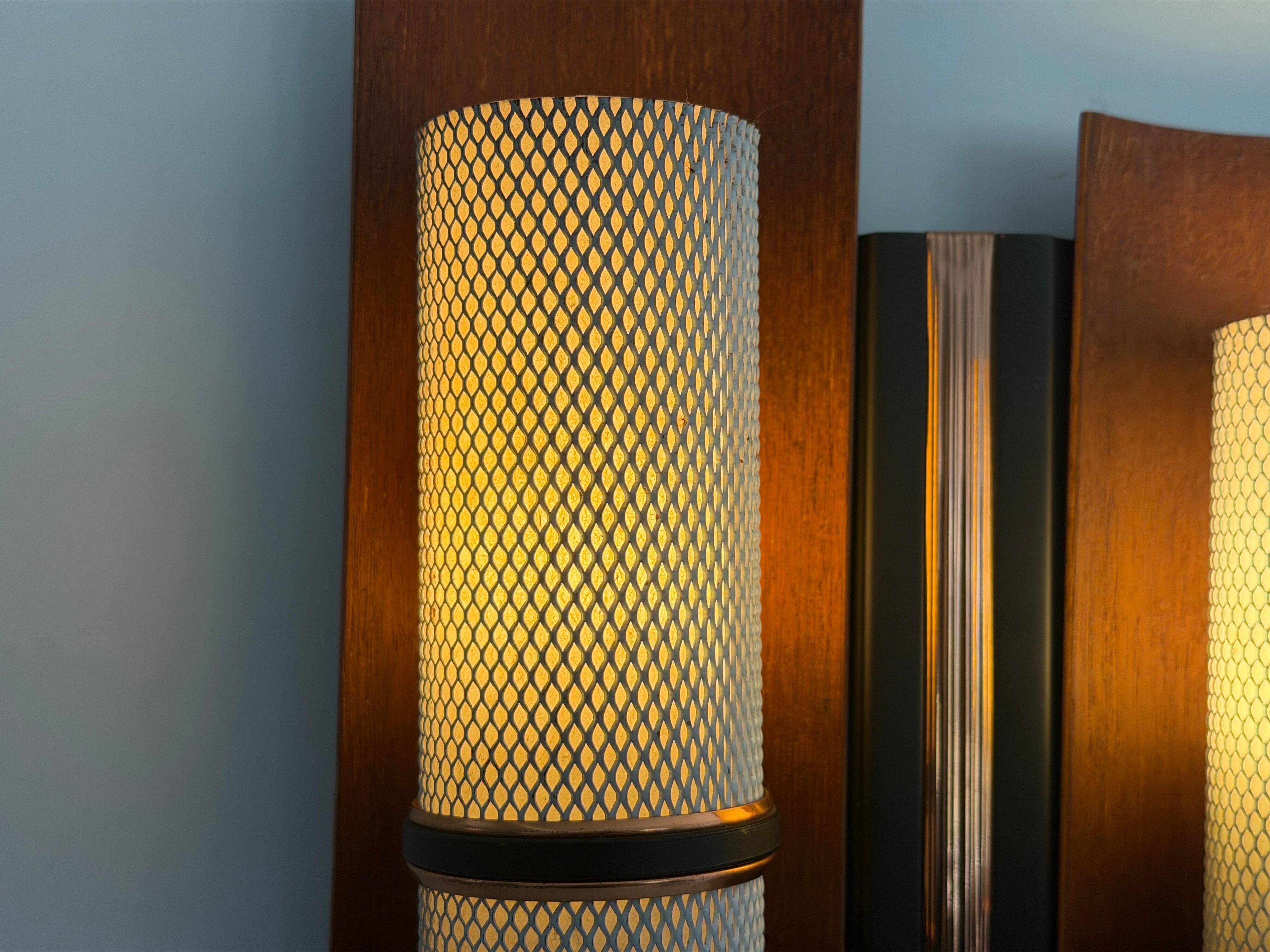 Simple mid-century wall light in metal, wooden and copper base, 1960s, Germany.