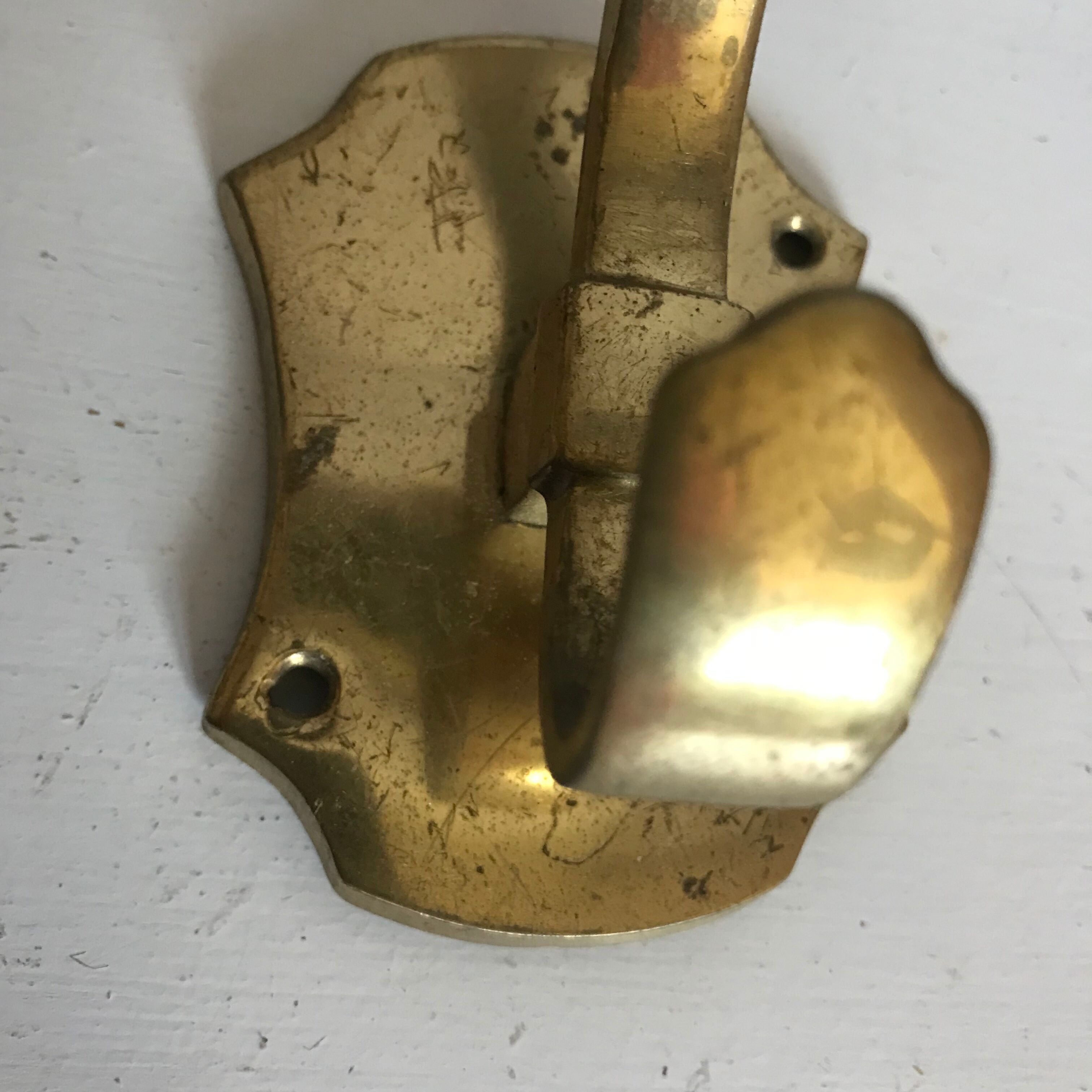 Pair of brass patères