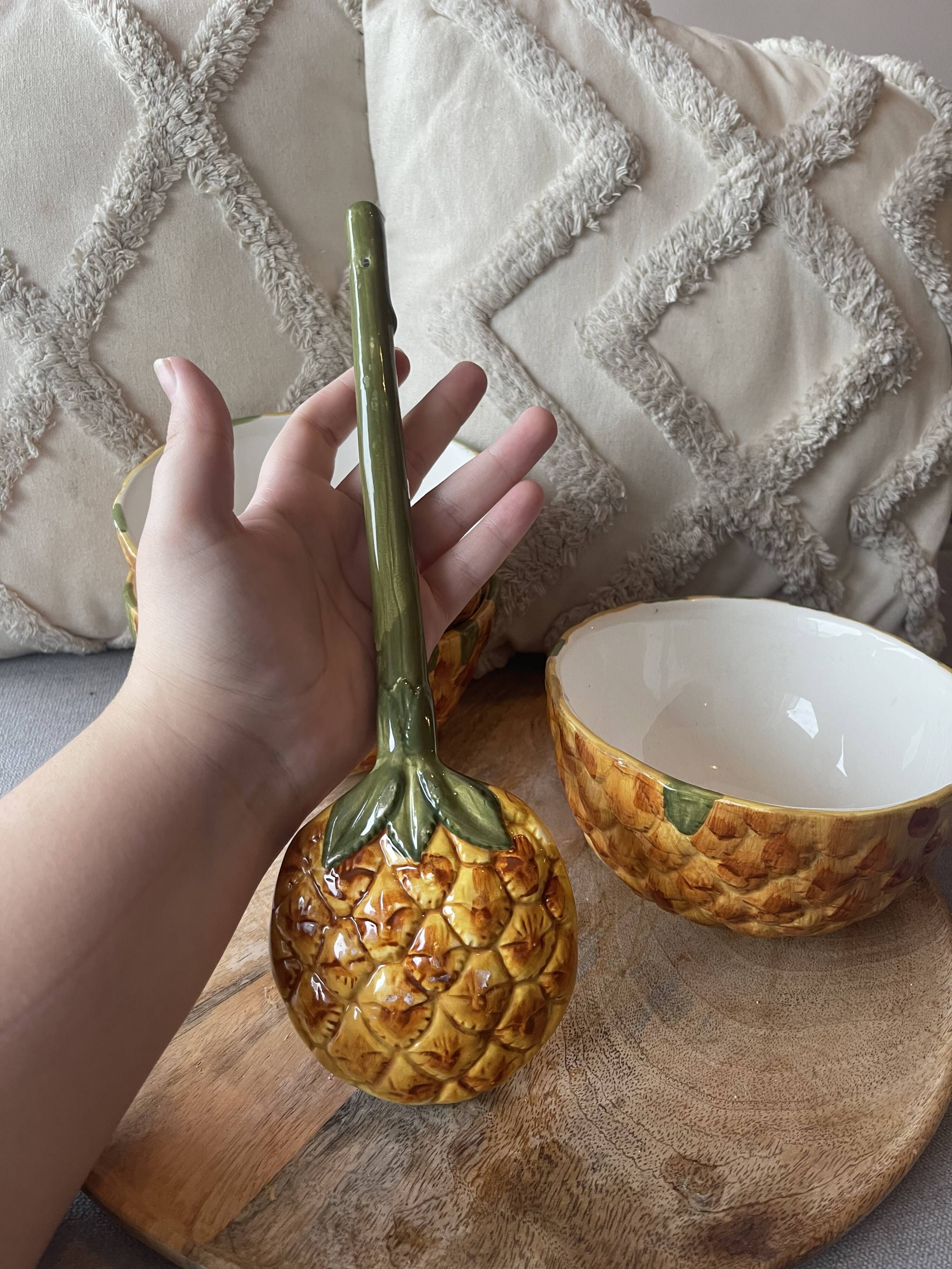 Old set of bowls and spoons in the shape of vintage pineapple