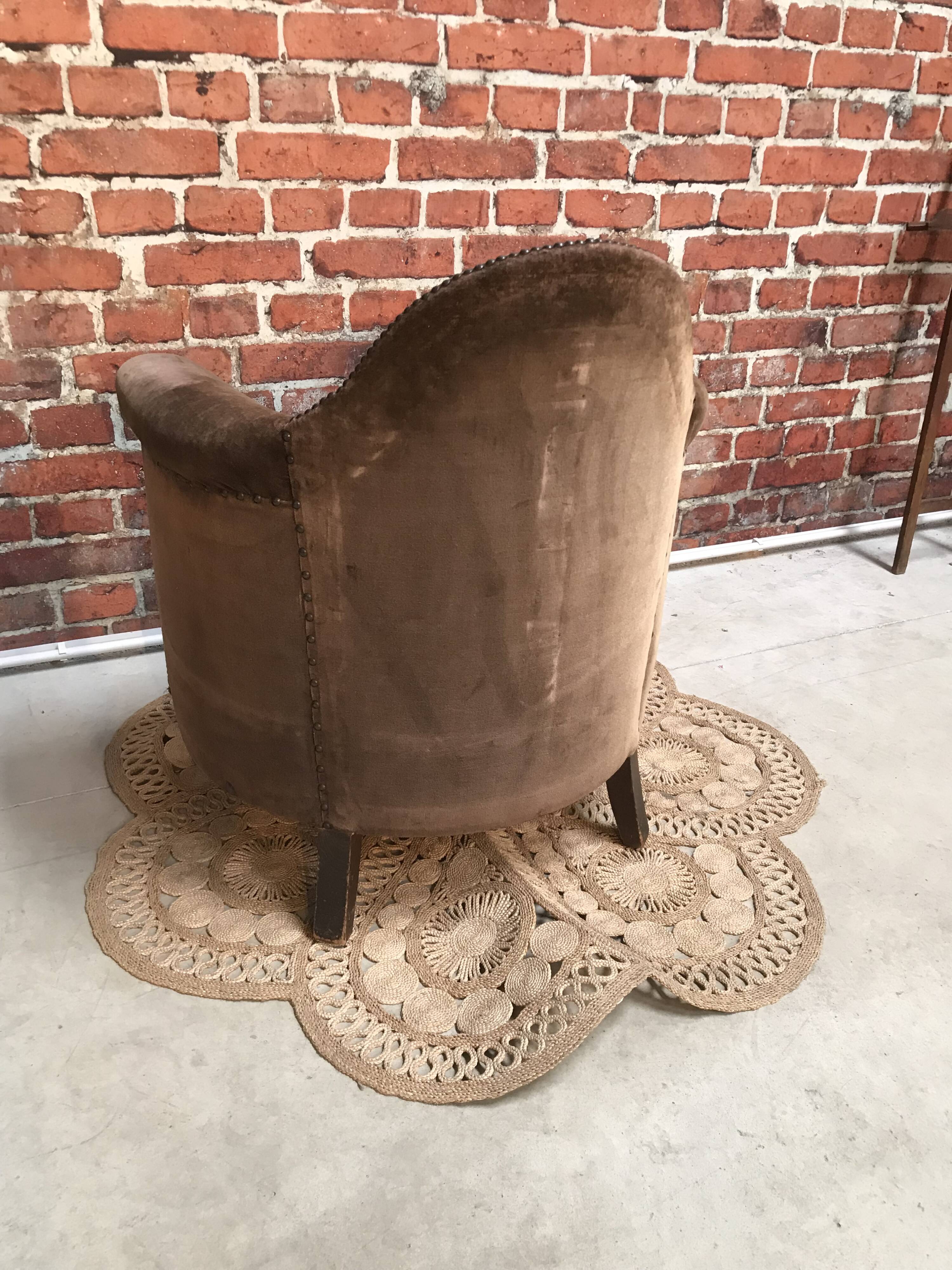 Club armchair in brown fabric