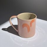 pink and orange mug