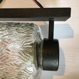 Black metal and molded glass wall sconce