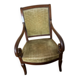 Armchair with a scroll, upholstered in green velvet