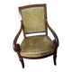 Armchair with a scroll, upholstered in green velvet