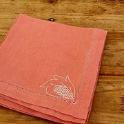 Set of 4 embroidered pink napkins.