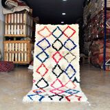 Small vintage beni ouarain rug