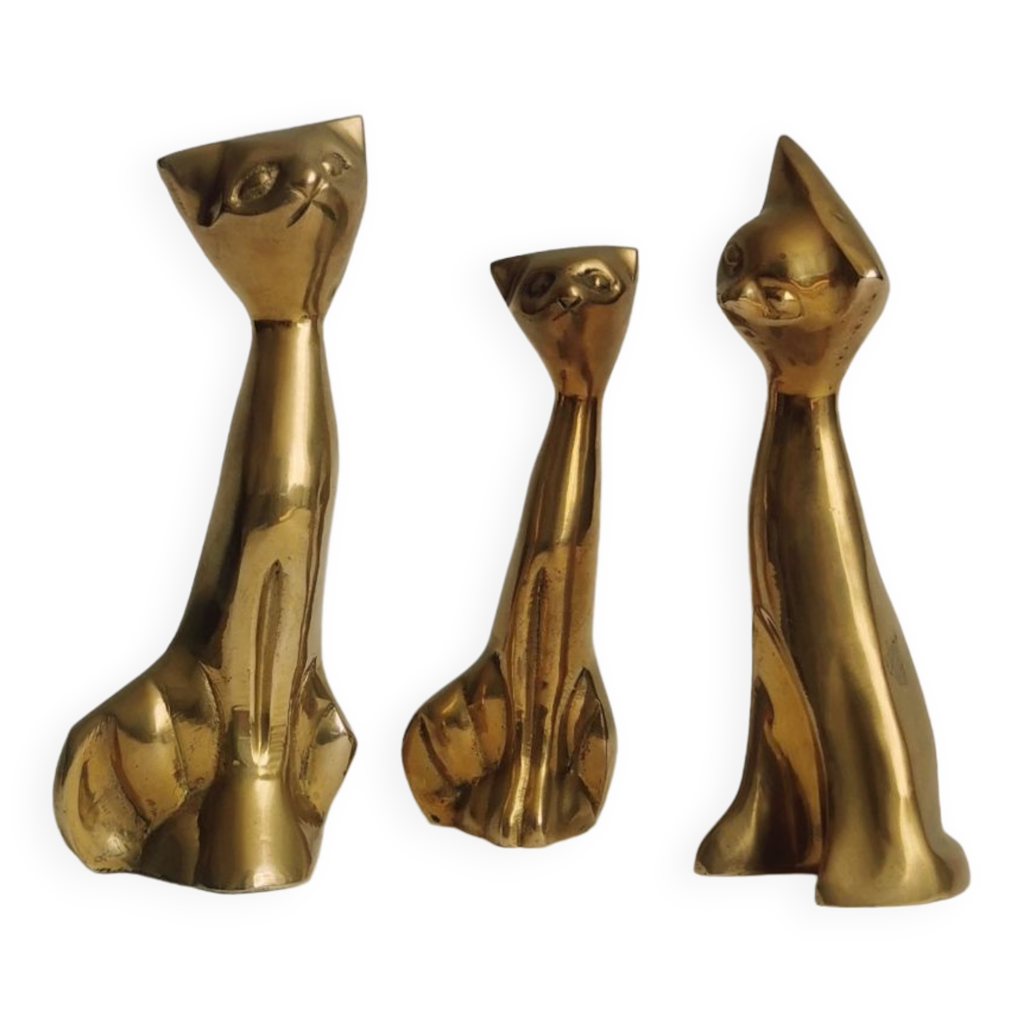 Trio of cats in gilded brass