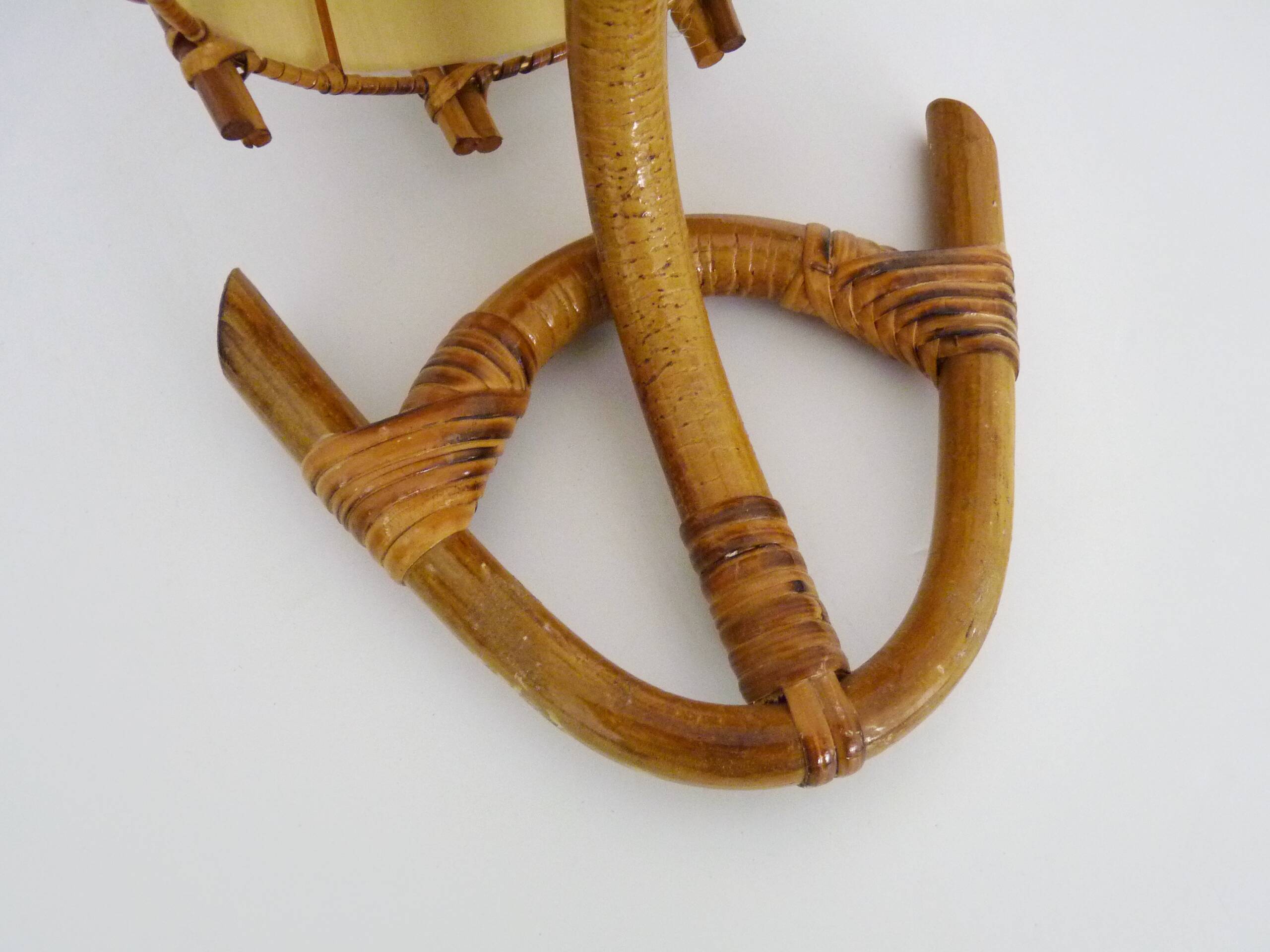 Louis Sognot rattan and bamboo wall light. 1950s