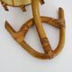 Louis Sognot rattan and bamboo wall light. 1950s