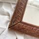 Antique mercury glass barber mirror and carved wooden frame