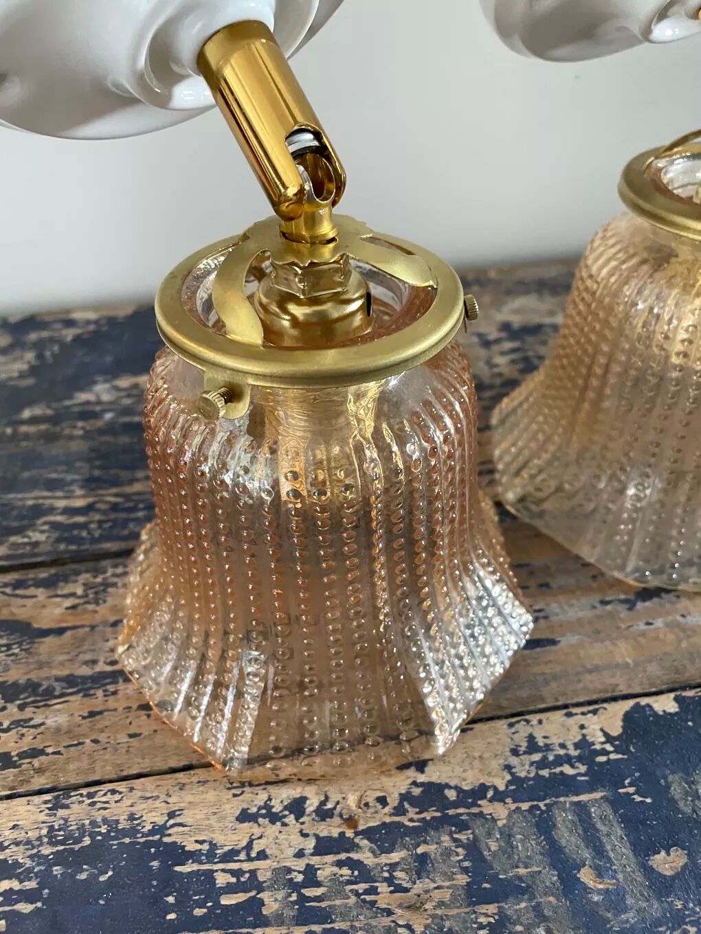 Pair of vintage sconces in electrified gold chiseled glass
