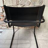Armchair in black lacquered metal