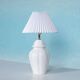 Vintage table lamp in woven ceramic Regency style.
