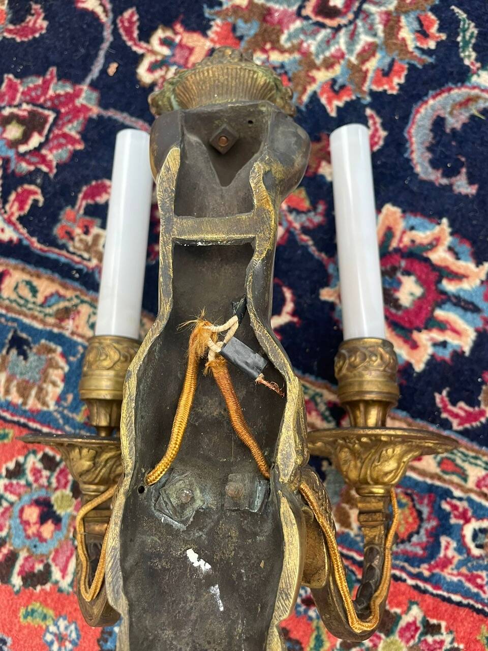 Pair of gilt bronze wall sconces with caryatid and Atlante decoration, 18th century.