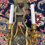 Pair of gilt bronze wall sconces with caryatid and Atlante decoration, 18th century.