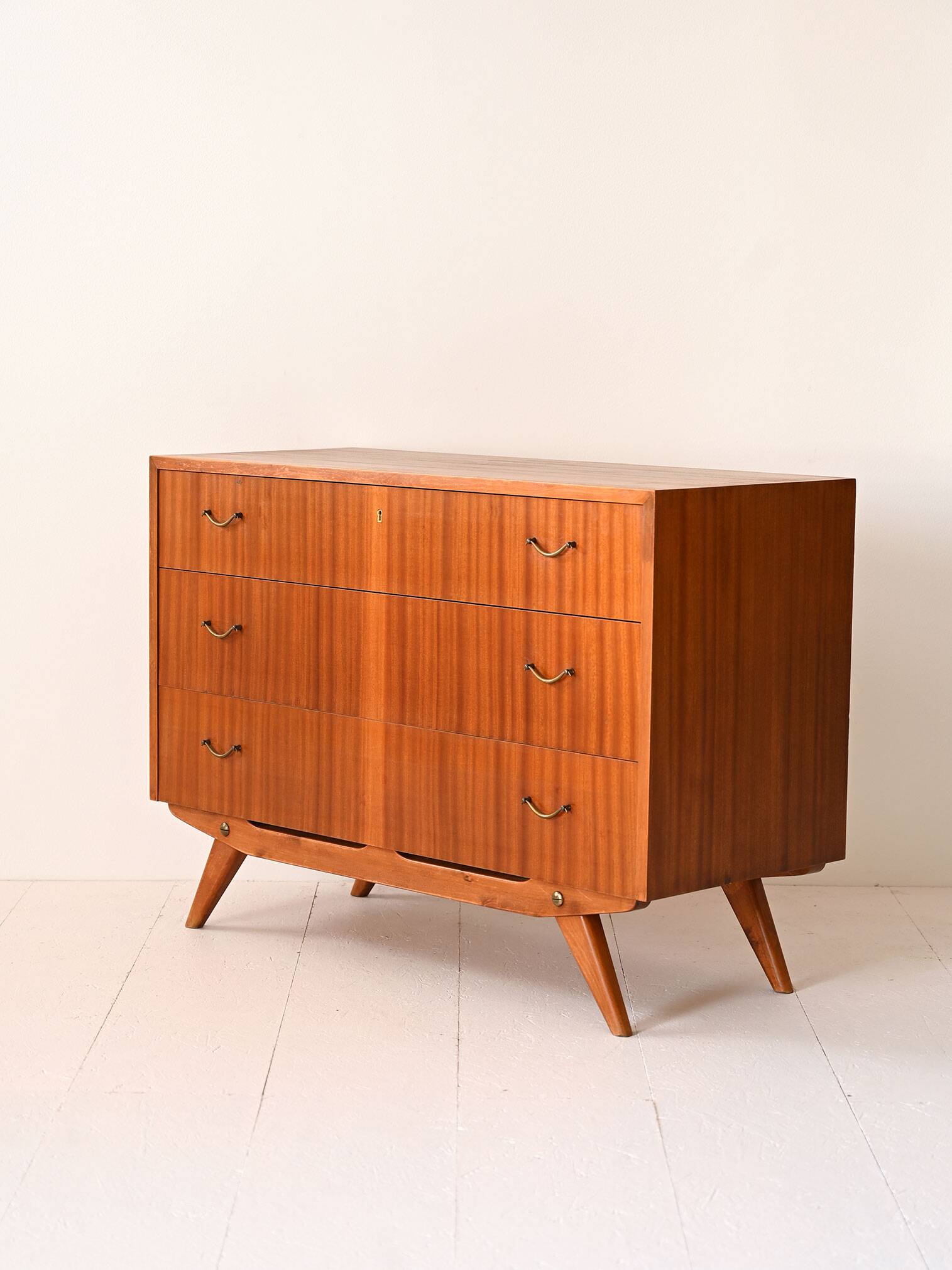 Scandinavian chest of drawers with metal handles