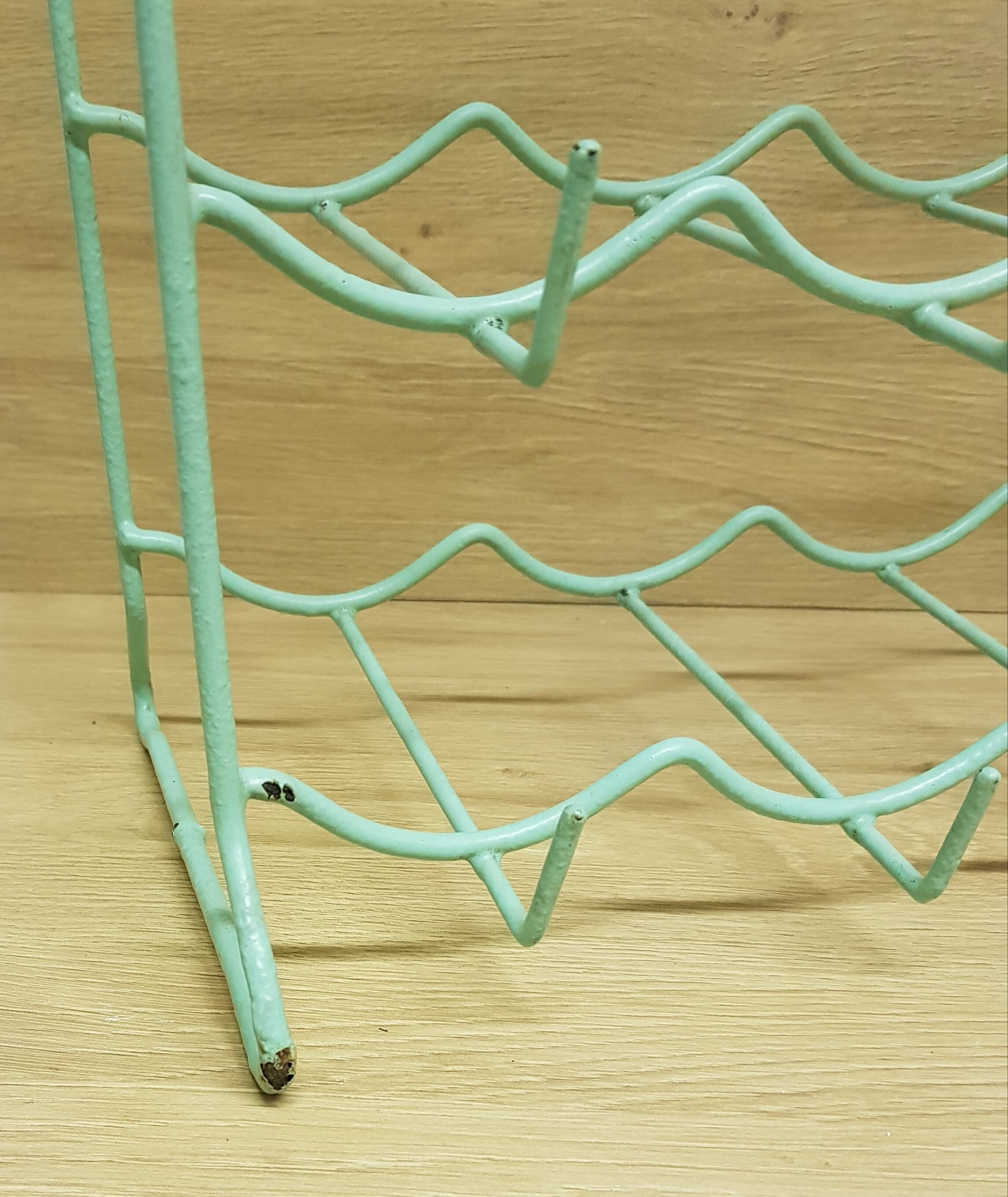 Metal aqua green bottle rack