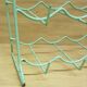 Metal aqua green bottle rack
