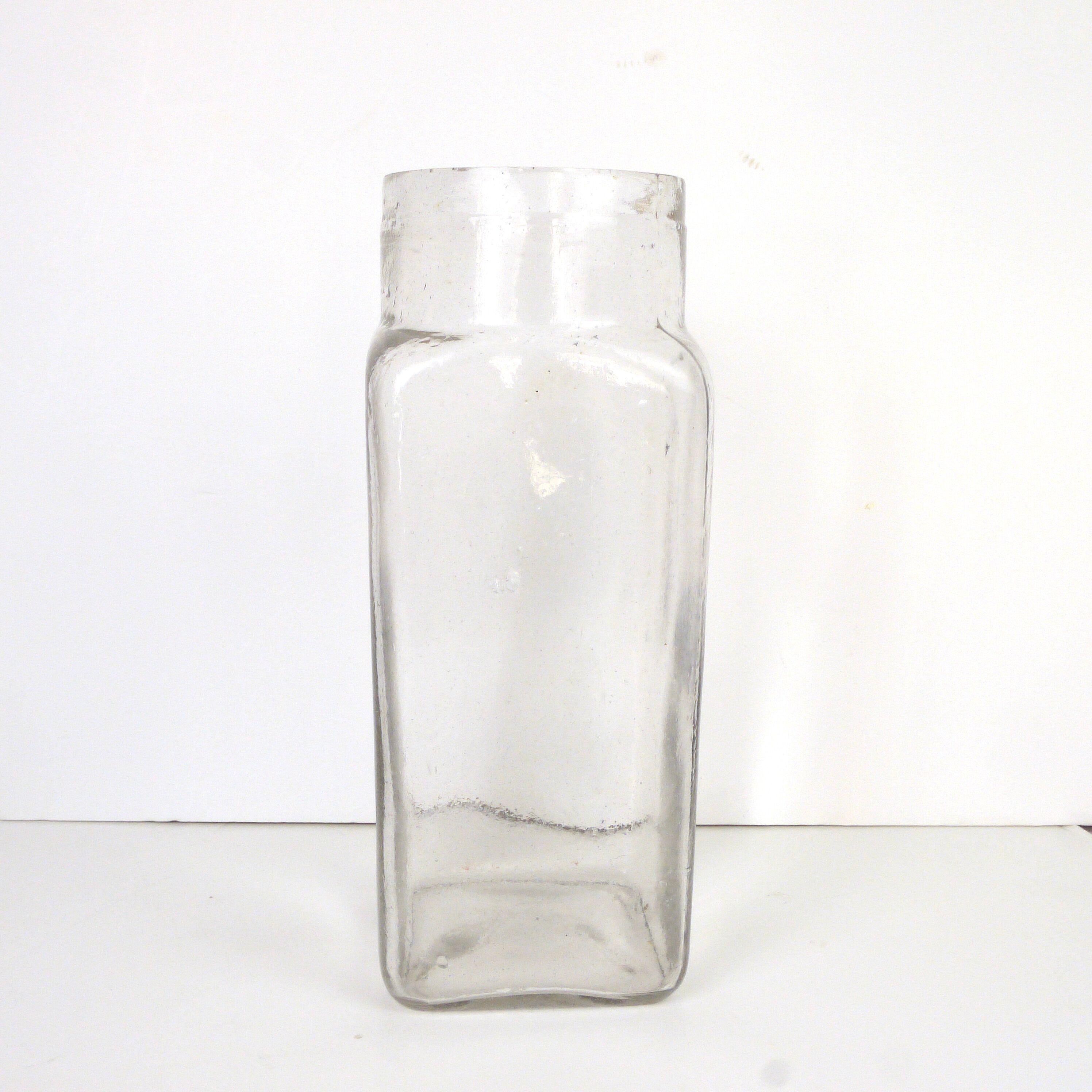 Glass vase, old pharmacy jar