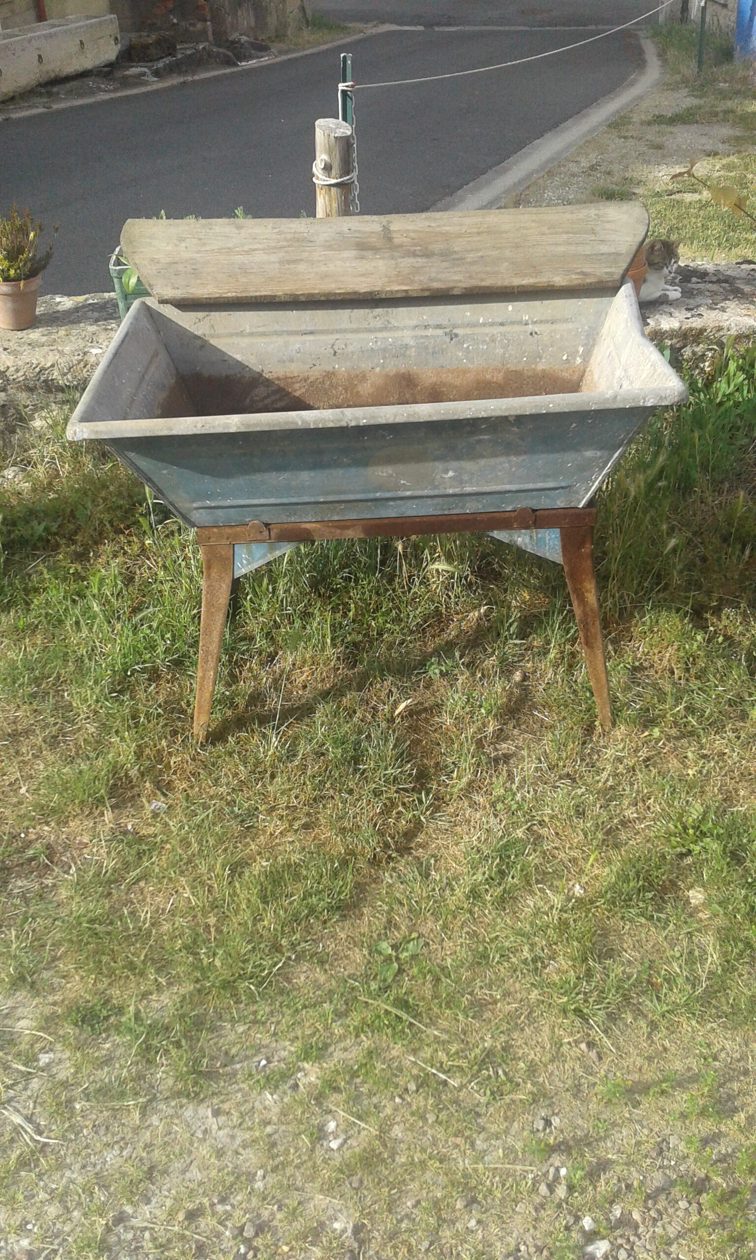 Old galvanized wash on foot