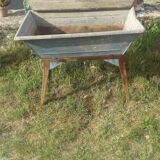 Old galvanized wash on foot