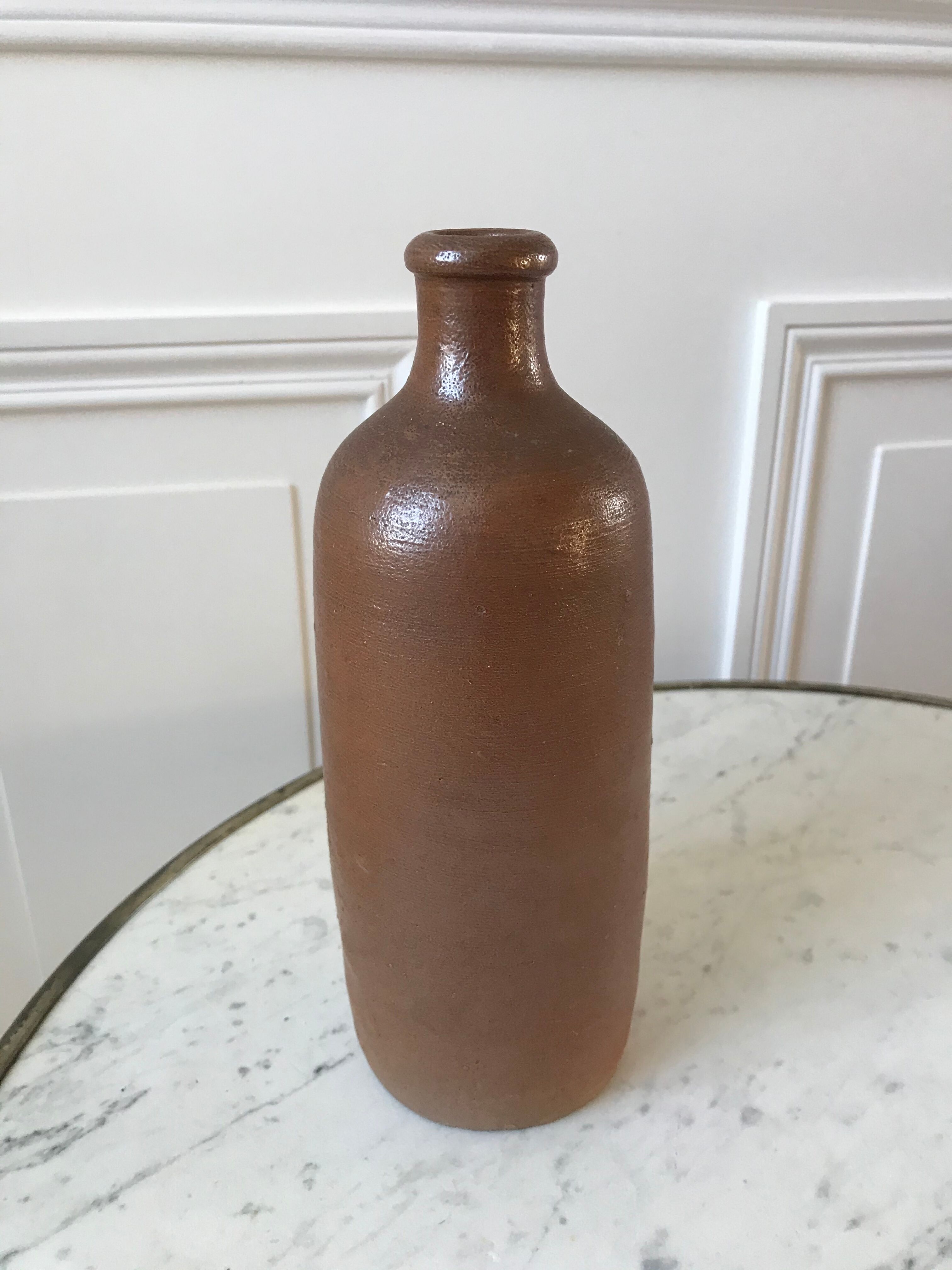 Stoneware bottle handmade early twentieth century