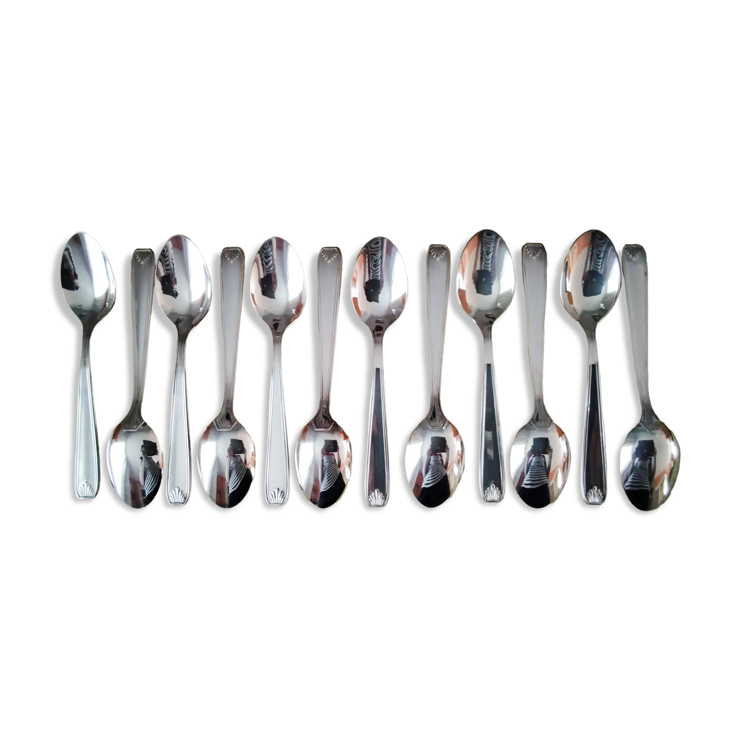 Set of 12 silver-plated coffee spoons in "shell" design.