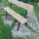 Antique garden bench with cast iron legs