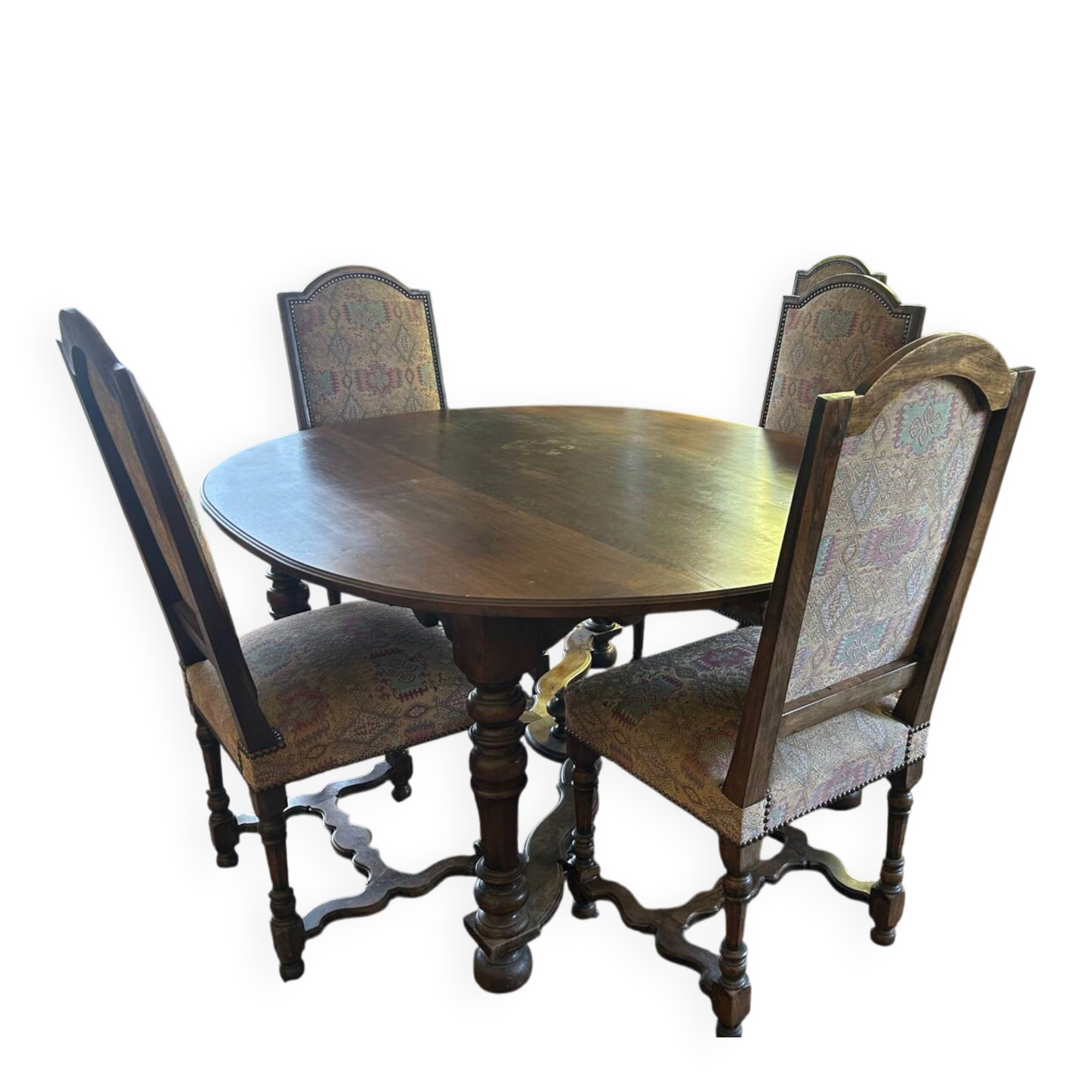Solid oak dining table and 6 matching chairs.
