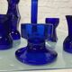 Set of 7 vintage cobalt blue glass footed candlesticks