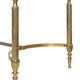 Coffee table in gilded brass with a mirrored eglomisé glass top.