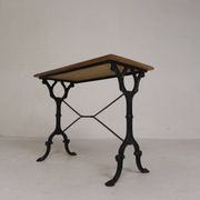 Bistro table with an oak top on a cast iron base, 1930s.
