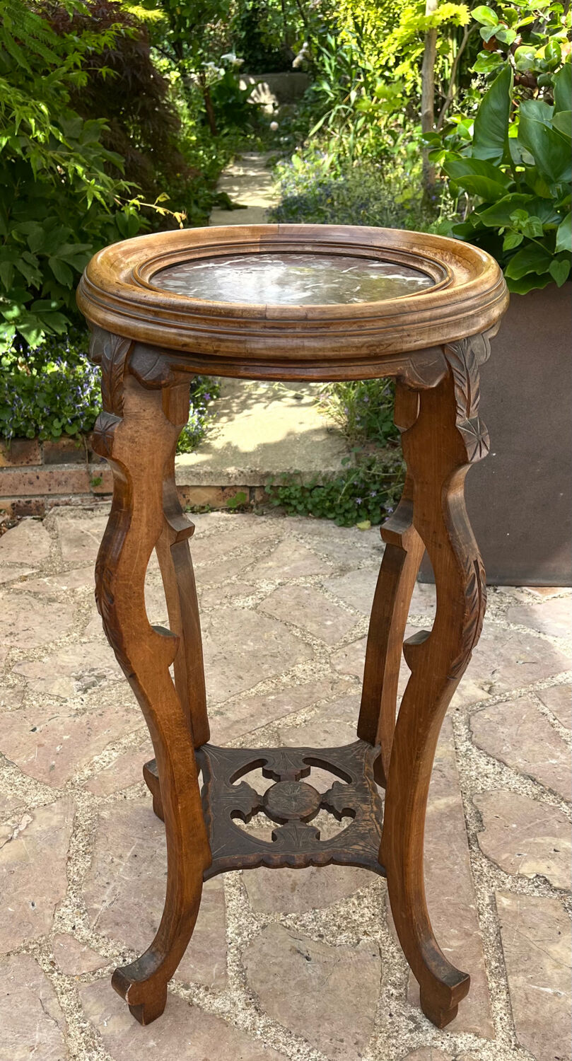 Old harness in wood with marble top