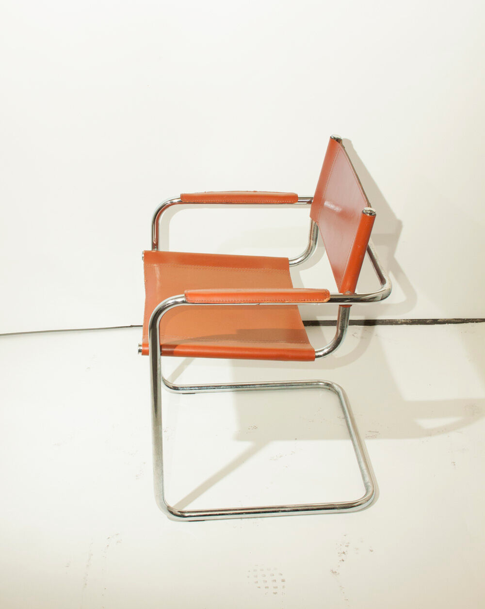Fauteuil vintage en métal et cuir