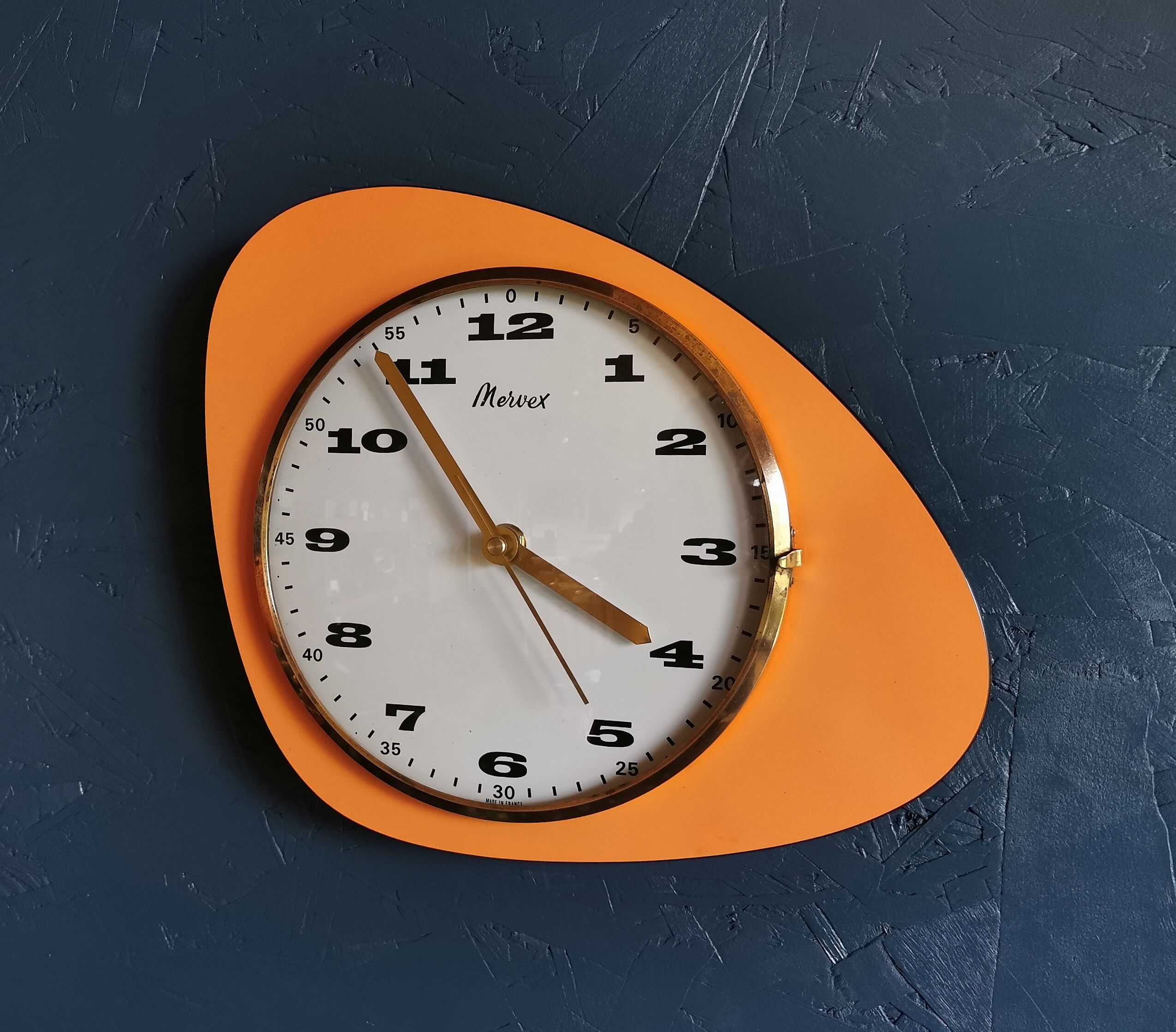 Vintage formica clock asymmetrical silent wall clock "Mervex orange"