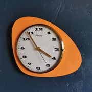 Vintage formica clock asymmetrical silent wall clock "Mervex orange"