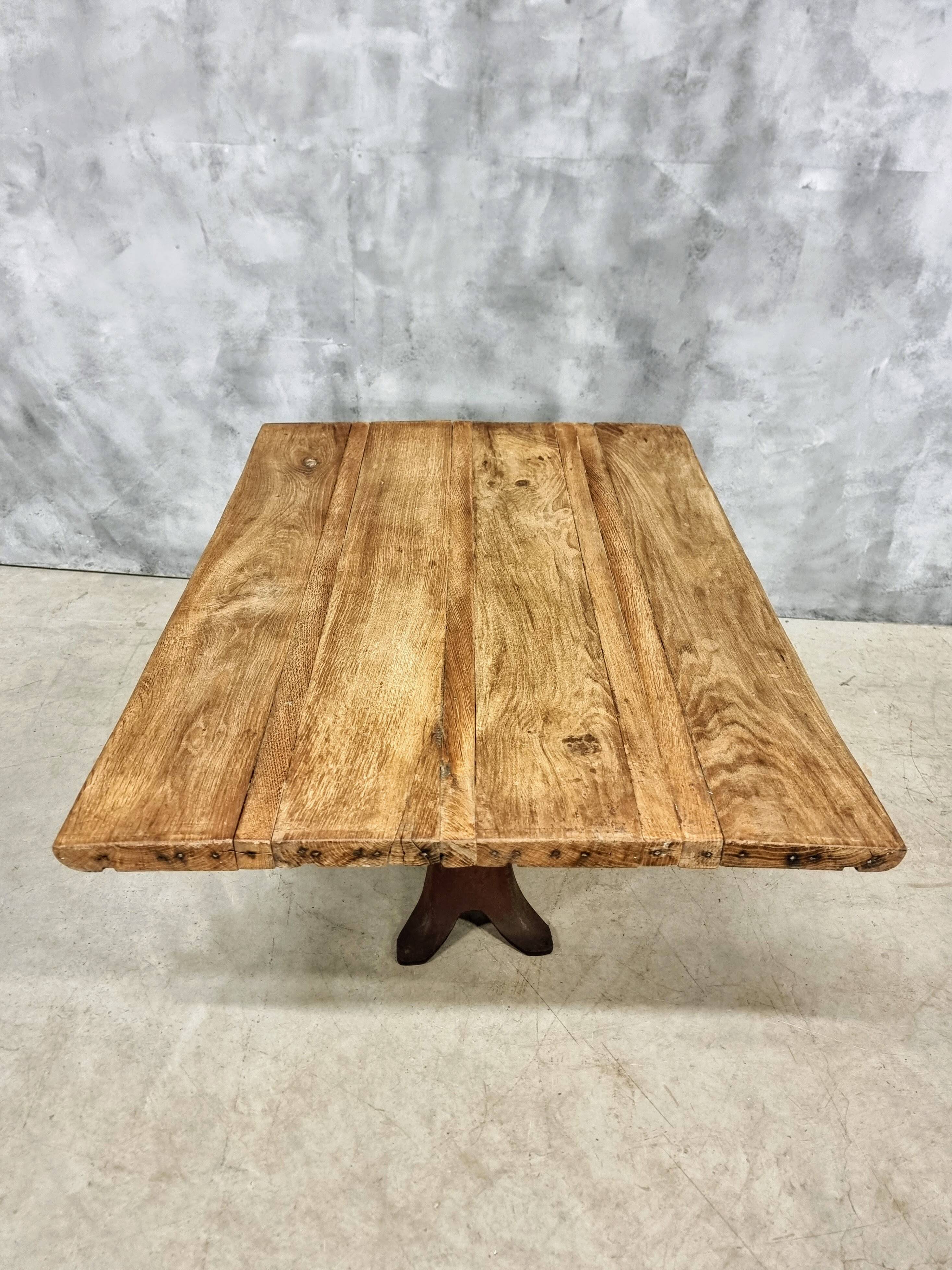 Antique oak dining table on cast iron base 93 x 123 cm