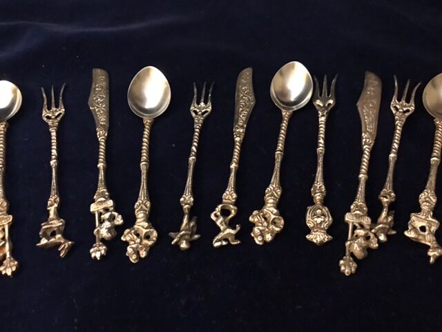 Set 11 of old cutlery with silver metal desert