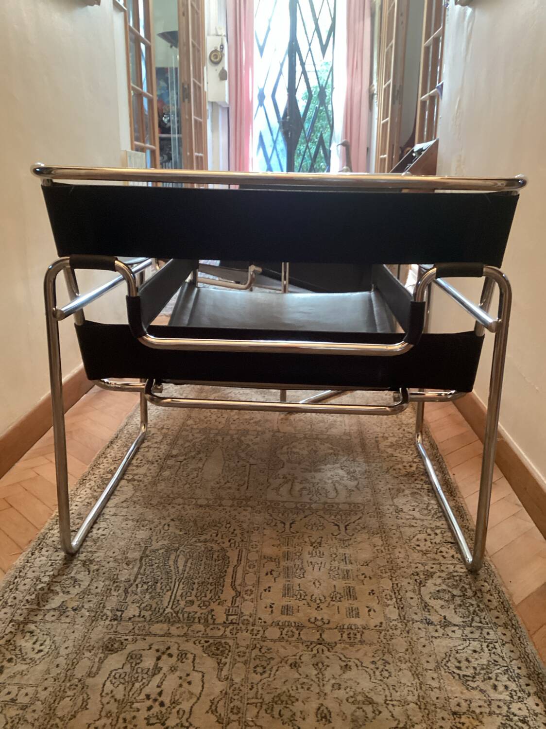 Pair of Wassily black leather armchairs