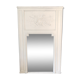 Fireplace trumeau mirror decorated with the attributes of music