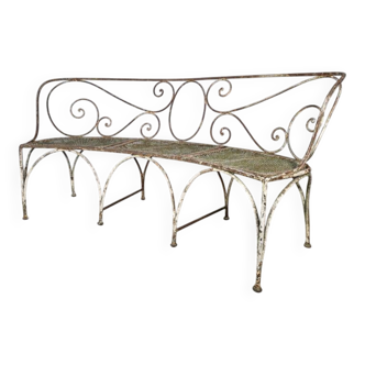 Beautiful curved garden bench from the late 19th century in iron.