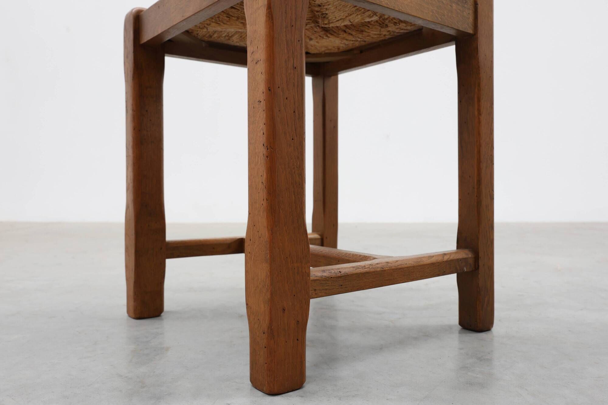Set of 6 rustic oak ladder-back chairs with rush seats, France, 20th centur