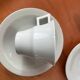 Art Deco cups and saucers by Théodore Haviland in celadon.