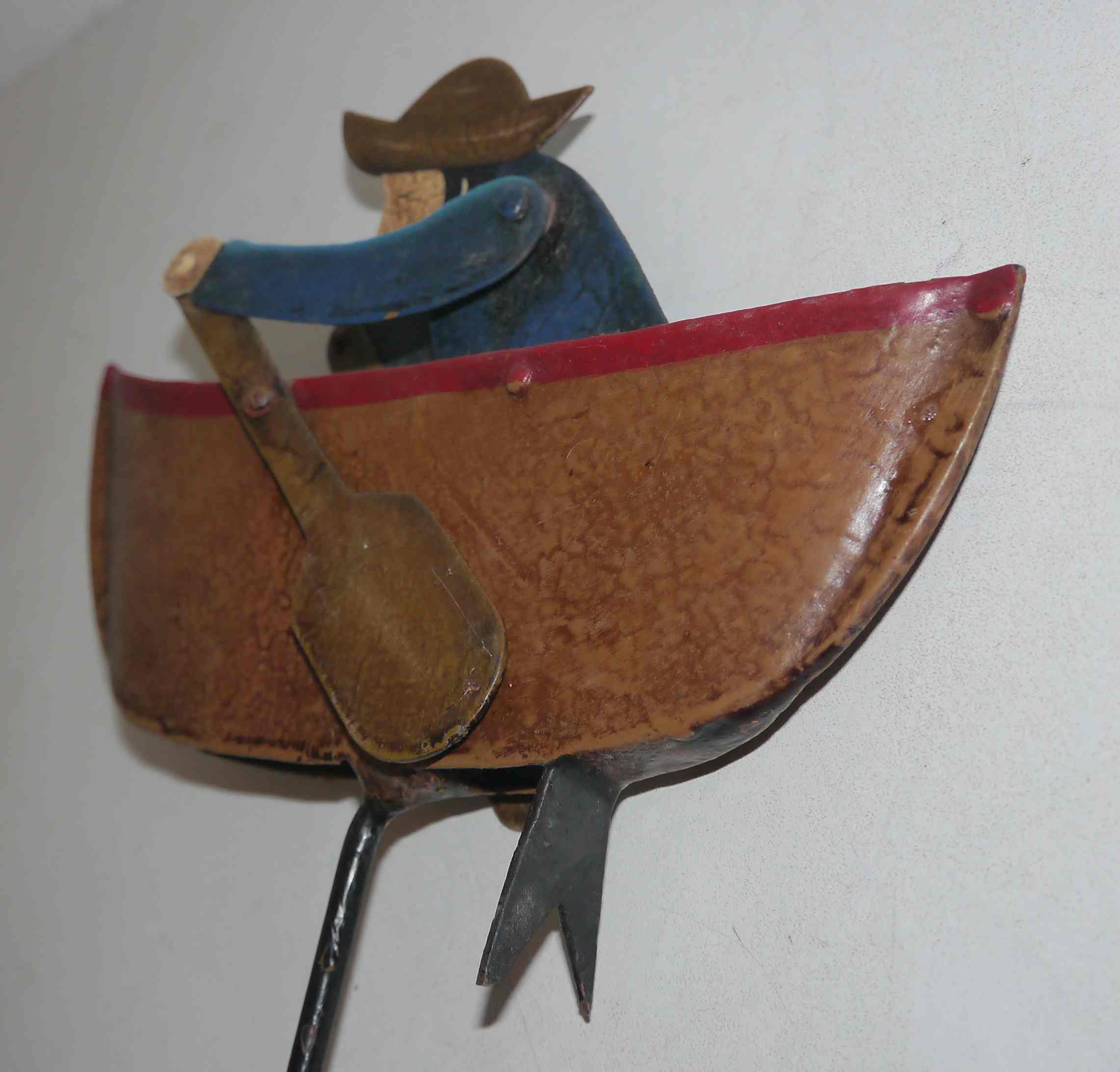 Old fishing counter balance toy in a boat