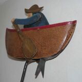 Old fishing counter balance toy in a boat